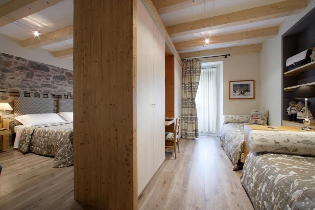 Hotel Savoia Dal 1924 San Martino Di Castrozza Chambre photo